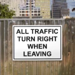 All Traffic Turn Right When Leaving Sign