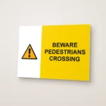 Beware Pedestrians Crossing Sign