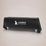 Printed Tablecloths: Black printed tablecloth with a company logo
