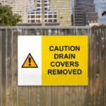 Caution Drain Covers Removed Sign