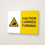 Caution Lorries Turning Sign