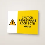 Caution Pedestrians Look Both Ways Sign
