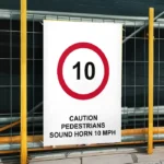 Caution Pedestrians Sound Horn 10 mph Sign