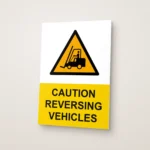 Caution Reversing Vehicles Sign