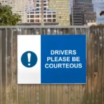 Drivers Please Be Courteous Sign