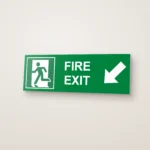 Fire Exit Running Man Arrow Diagonal Left Down (HTM 65) Sign