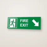 Fire Exit Running Man Arrow Diagonal Right Down (HTM 65) Sign