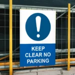 Keep Clear No Parking Sign