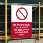 No Trespassing Authorised Vehicles Only Beyond This Point Sign
