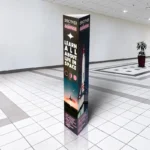 Cardboard Totem Displays: Printed cardboard totem display in a shopping centre