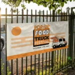 Exhibition Banners: Printed food truck festival banner on black railings