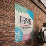 Waterproof Posters: Printed outdoor poster on a brick wall