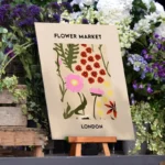 Shop Signs: Printed sign on an easel at a market