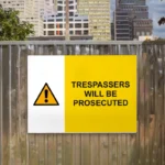 Trespassers Will Be Prosecuted Sign