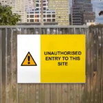 Unauthorised Entry to This Site Sign
